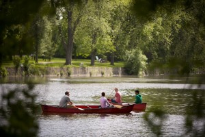 Two canoes with smiling students         